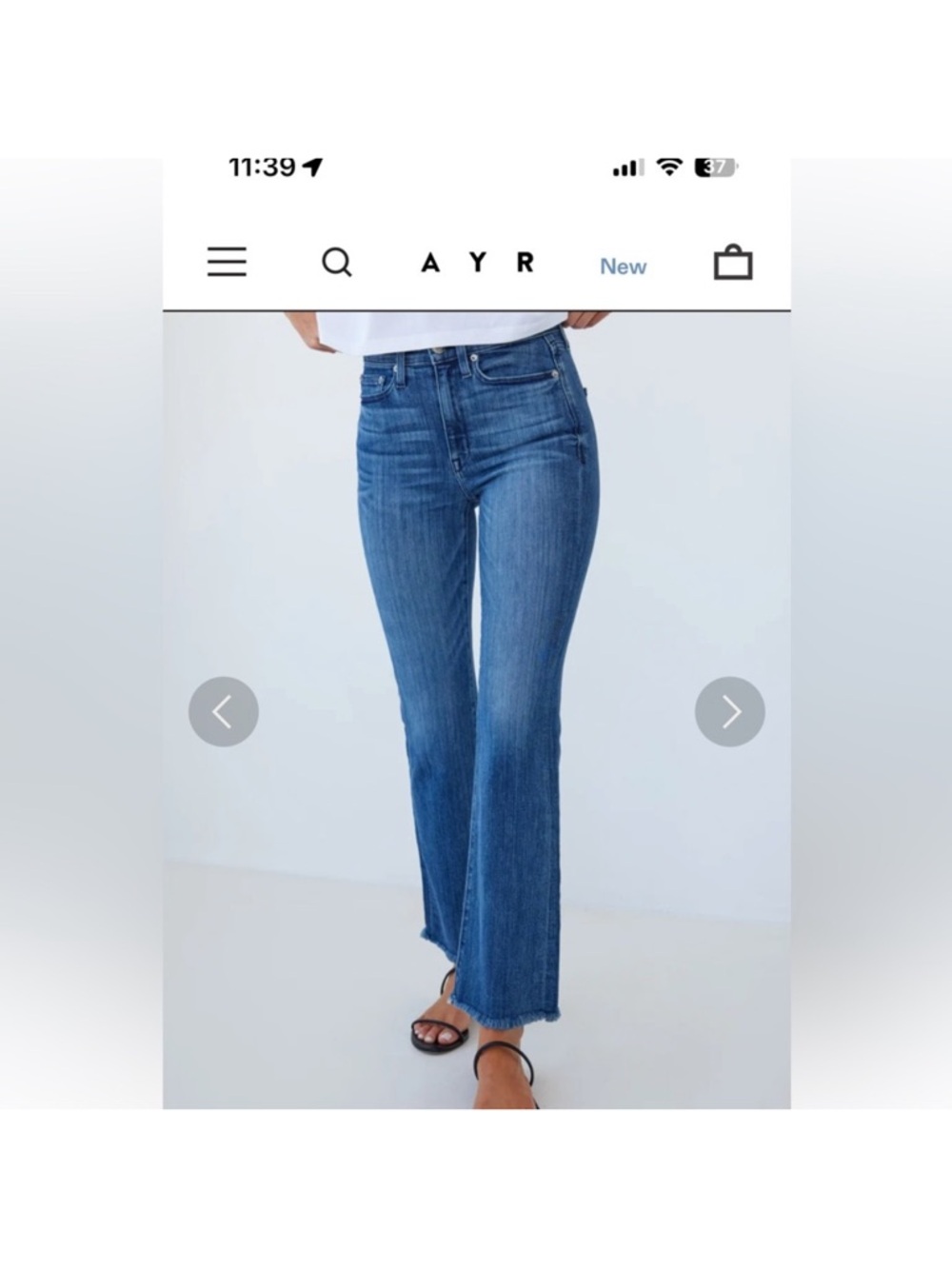 AYR The Bomb Pop blue denim high-rise straight-leg jeans with a raw hem.